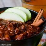 This Paleo and Whole30 Apple Cider Chili will warm your bones. Sweet apple cider, apples and cinnamon combine with chili powder for the perfect fall treat!